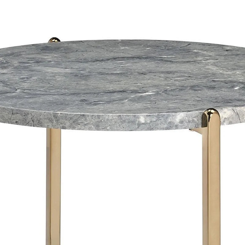 Table d’appoint ovale aspect marbre avec piètement en X doré
